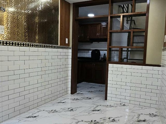Bán nhà hẻm thông thoáng phường Xóm Chiếu Q4 Ngang 2 nở Ngang 4 dài 6.5 m đúc 4 tấm