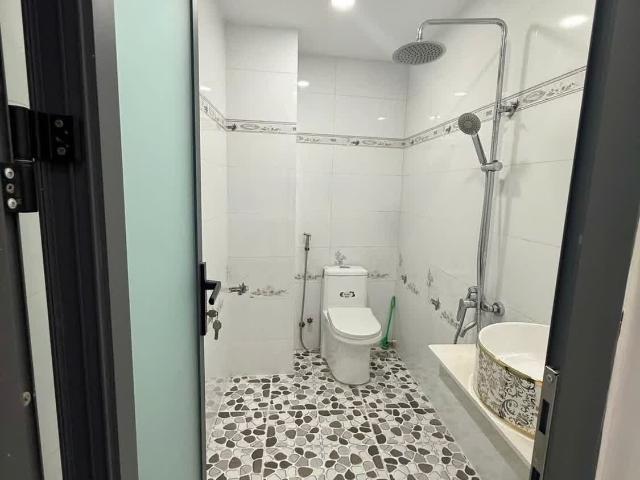 Bán nhà hẻm xe hơi Dương Quảng Hàm, Phường An Nhơn 3 phòng ngủ 5 tầng nhỉnh 7 đồng
