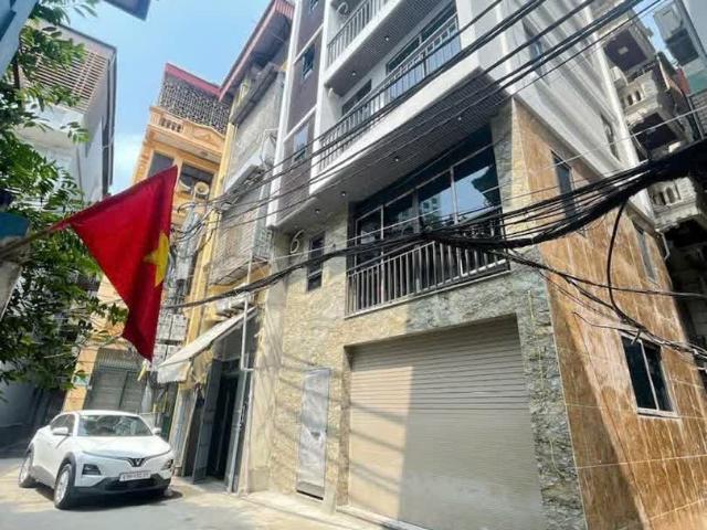 Bán Nhà Phố Tô Vĩnh Diện 50m x 6 Tầng Phân Lô Ô Tô Tránh Trước Nhà Giá 19,8 Tỷ