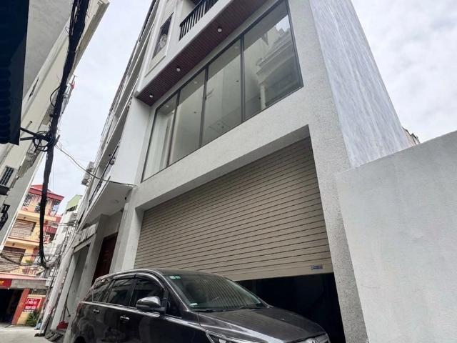 Bán nhà thạch bàn 50m2, 6 tầng mới thang máy, ô tô đỗ cửa 12. X TỶ
