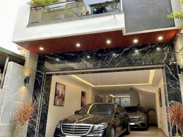 Bán nhà việt hưng 110m2 7 tầng thang máy gara 3 ô tô 23. X Tỷ