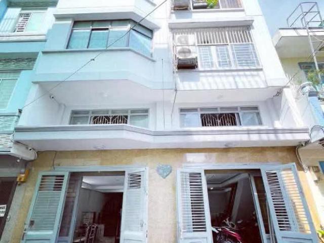 Bán nhà 4 tầng trung tâm q4 hẻm xe hơi an ninh tốt