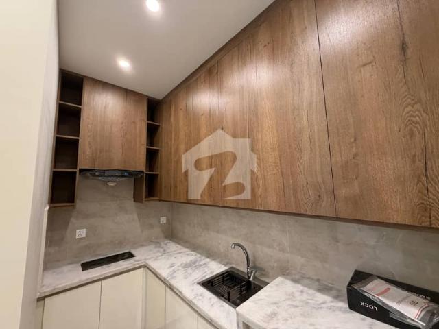 Bahria town lahore one bedroom brand new flat for sale on easy installments plan