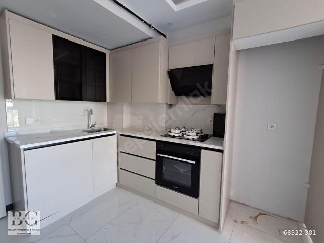 BAL GAYRİMENKUL'den KEMALPAŞA'da CADDE ÜZERİ SIFIR 2+1 DAİRE