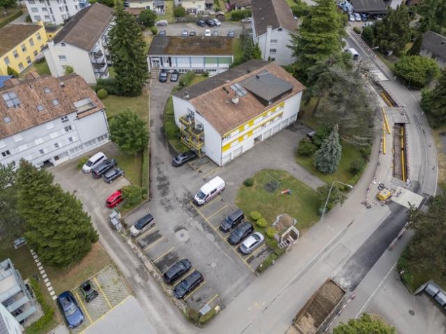 Bauland mit best. Mehrfamilienhaus und Gewerbegebäude