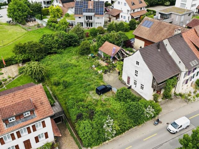 Bauland mit bewilligtem Projekt für ein Zweifamilienhaus