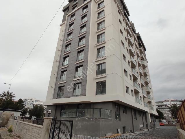 Bayraklı Adalet Mahallesi'nde Satılık Sıfır 1+1 Daire