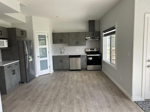 Be the First Tenant! Lakeview Walk Out Legal Basement Suite in Walker