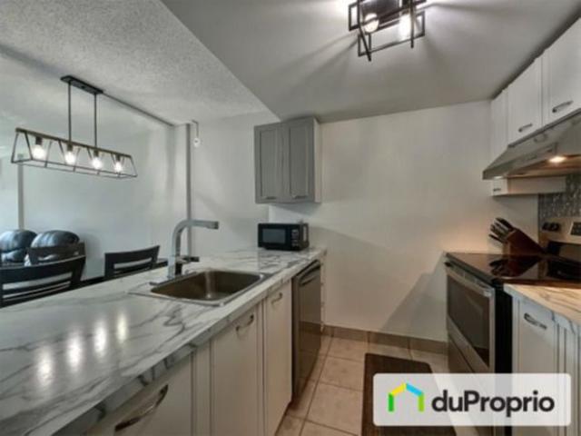 Beau Condo Meublé