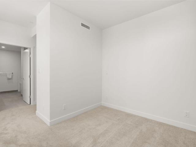 Beautiful and Bright Corner Three Bedroom Townhome in Convenient Surrey Central