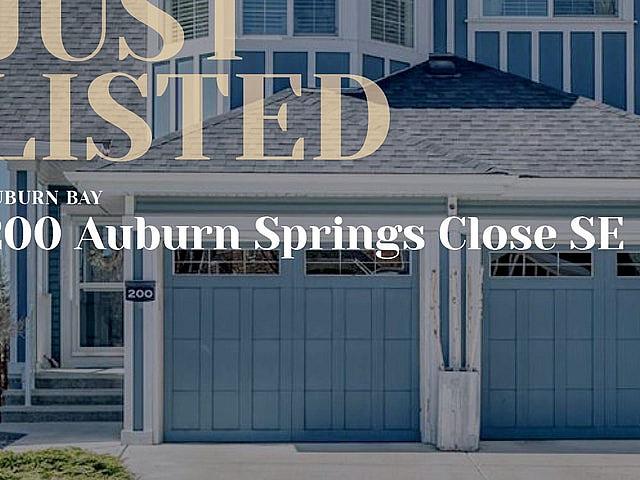 Beautiful Auburn Bay Home Backing Green Space!