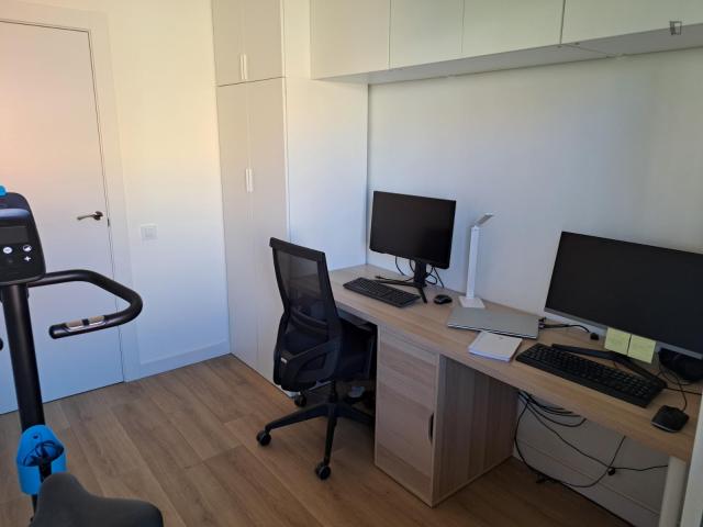 Beautiful doube bedroom with balcony in fully furnished apartment with home office well connected to the city center
