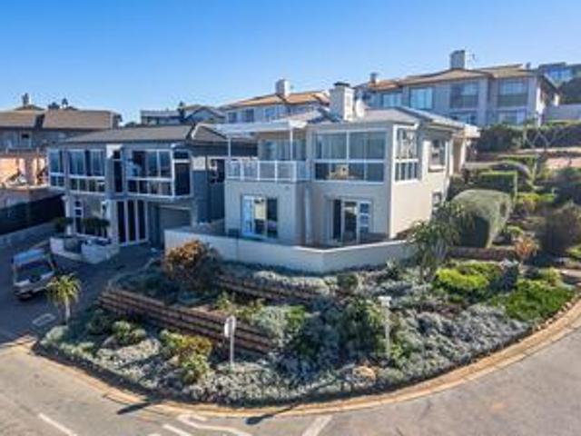 beautiful family home with 180° ocea.