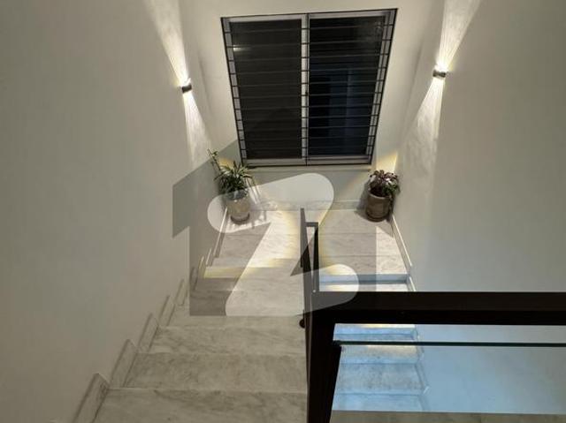 Beautiful house top location beautiful green lawn big cars parking modren fitting and fixtures for rent f 10