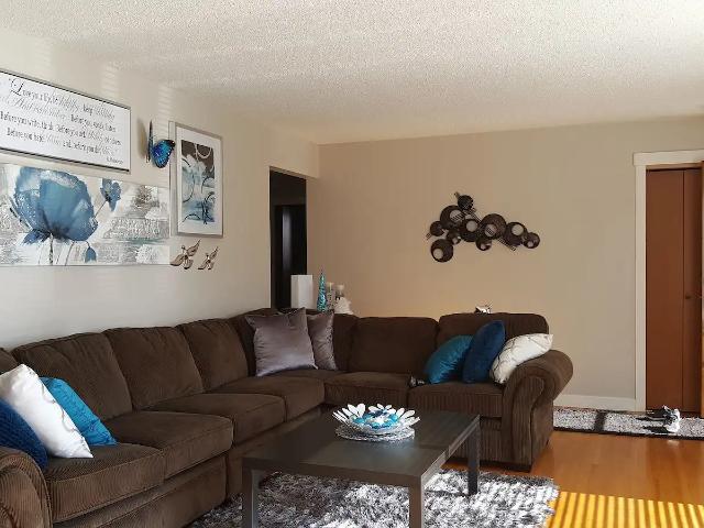 Beautiful large main floor suite on park like property