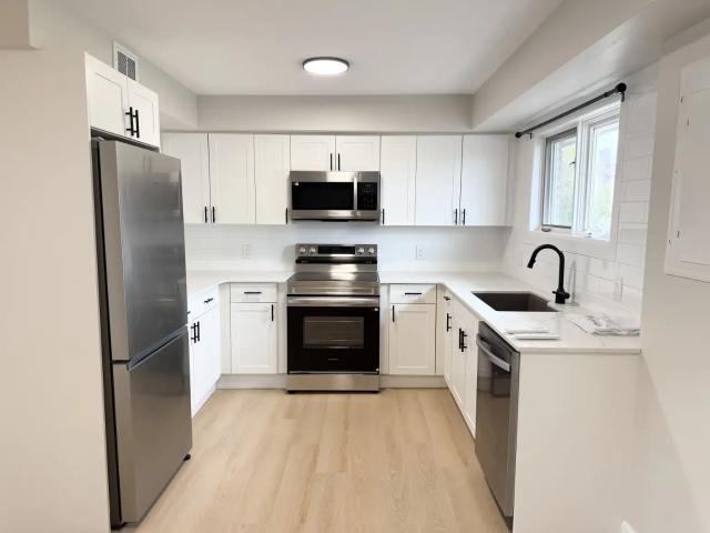 BEAUTIFUL NEWLY RENOVATED 3 BEDROOM, 1.5 BATHROOM IN COLLINS BAY WITH AC AND 2 PARKING