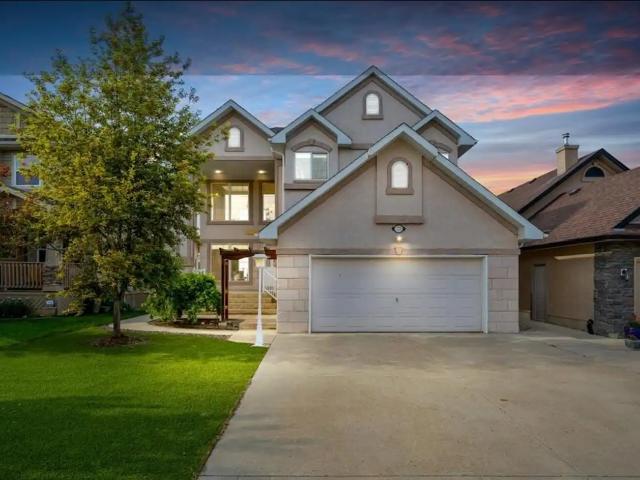 Beautiful SW Walkout 2 Story, 4 Room Home, Double Garage attach 2500 SQF Living