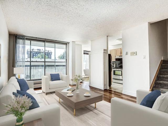 Beautiful Two Level Concrete Condo in the Heart of Connaught