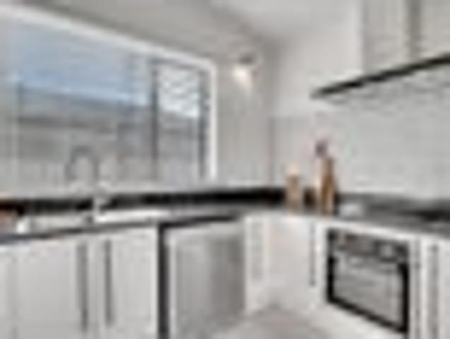 Beautifully Renovated Lock & Leave in Top Location