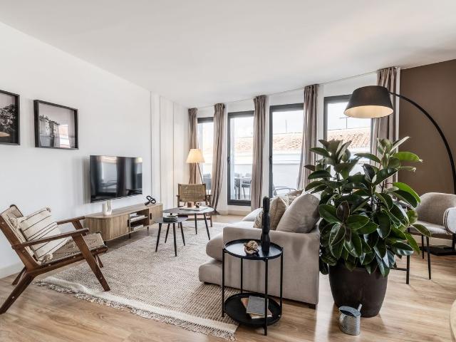 Beach Themed 3 Bedroom Apartment with Terrace and Workspace in Chueca, Madrid Amsterdam Apartments for Rent