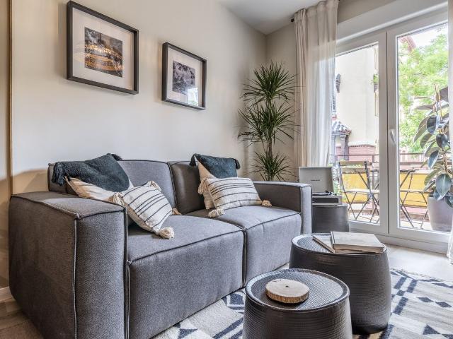 Beach Themed 1 Bedroom Apartment with Terrace and Workspace in Almagro, Madrid Amsterdam Apartments for Rent