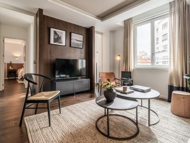 Beach Themed 2 Bedroom Apartment with Rooftop Pool and Gym in Malasaña, Madrid Amsterdam Apartments for Rent