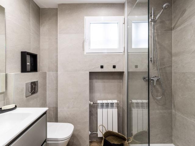 Beach Themed 2 Bedroom Apartment with Workstation and Doorman in Azca, Madrid Amsterdam Apartments for Rent
