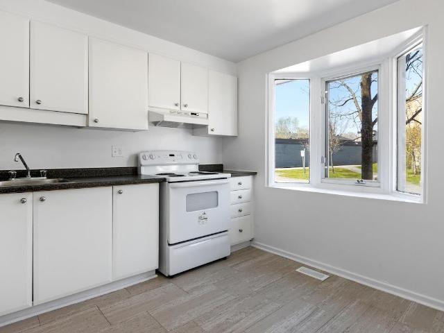 Beaconwood Village Townhomes 3 Bedroom Home for Rent at 1998 Beaconwood Dr, Ottawa, ON K1J 8M4 Beacon Hill