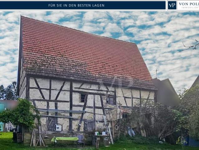 Bebautes Grundstück mit Abrisshaus und Scheune