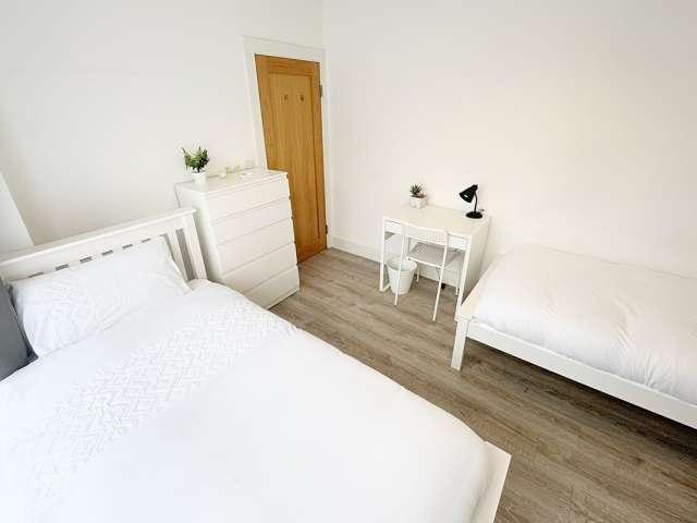 Bed for rent in shared male Twin 4 bedroom apartment