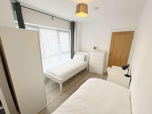 Bed for rent in shared male Twin 4 bedroom apartment