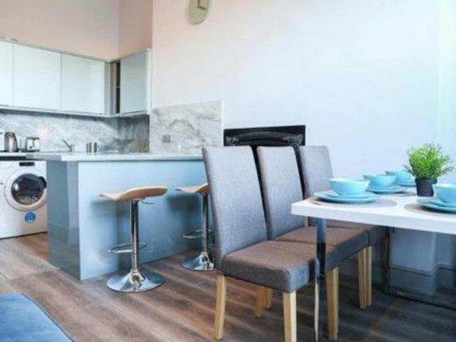 Bed in a bright triple bedroom, in Broadstone
