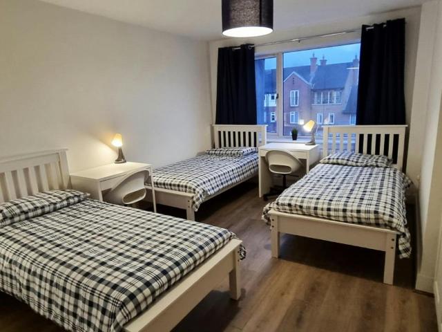 Bed in a comfy triple bedroom, in Grangegorman