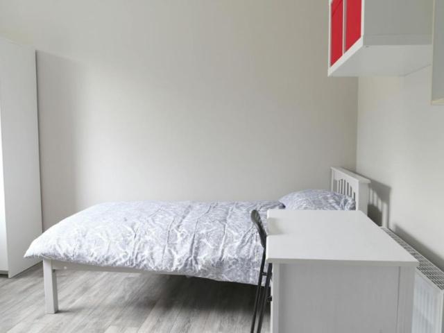 Bed in a homely twin bedroom, in Glasnevin
