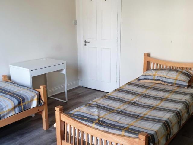 Bed in a homely twin bedroom, in Phibsborough