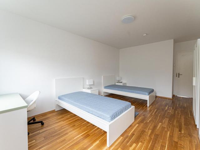 Bed in a large twin bedroom, in Niederschöneweide