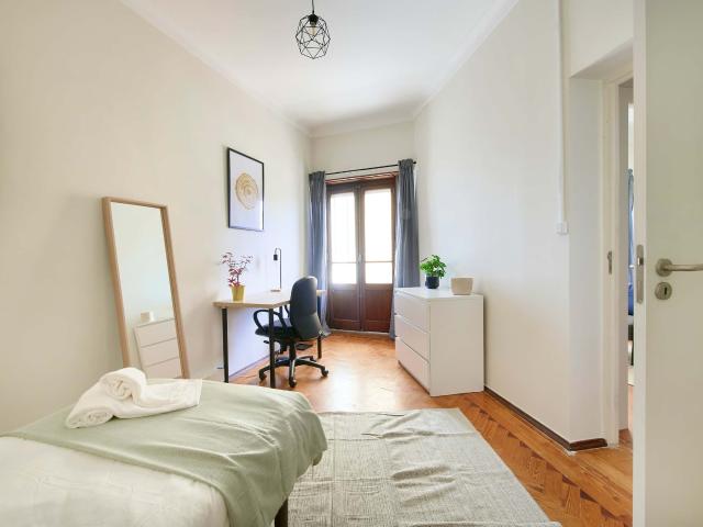 Bedroom in a 8 bedroom apartment in R. Diogo Couto, Lisbon Room 7