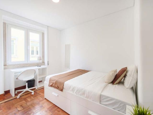 Bedroom in a 9 Bedroom Apartment in Rua Fialho de Almeida, Lisbon Room 4