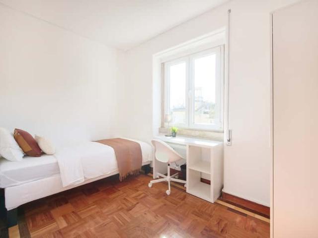 Bedroom in a 9 Bedroom Apartment in Rua Fialho de Almeida, Lisbon Room 9