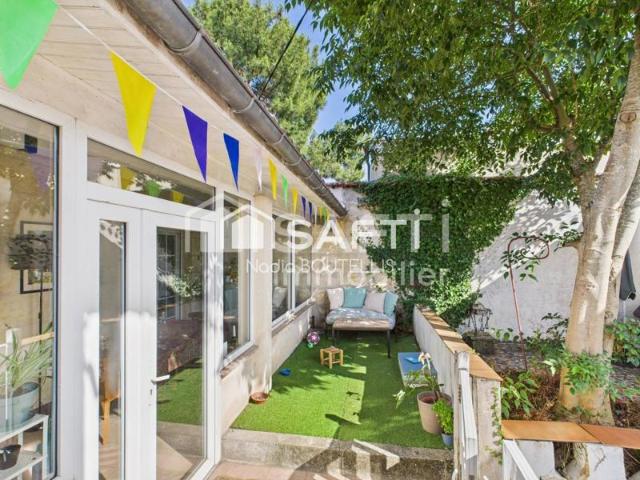 Bel appartement 4 piéces, jardin, véranda