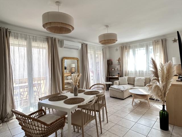 Bel appartement de type 4 92 m2 avec balcons et stationnement privé