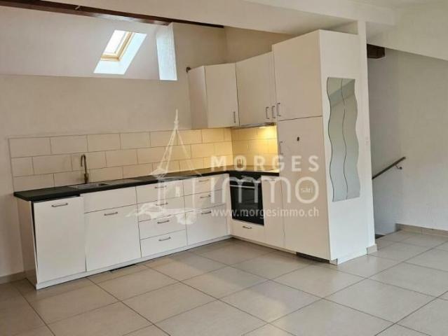 Bel appartement en demi niveaux dans les combles | dreamo. Ch
