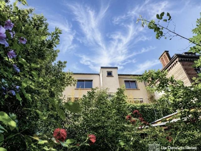Bel immeuble de 384 m2 secteur recherché, jardin, parkings