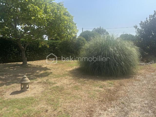 BELLE MAISON PLAIN PIED sur sous sol semi enterré GARAGE DOUBLE TERRAIN