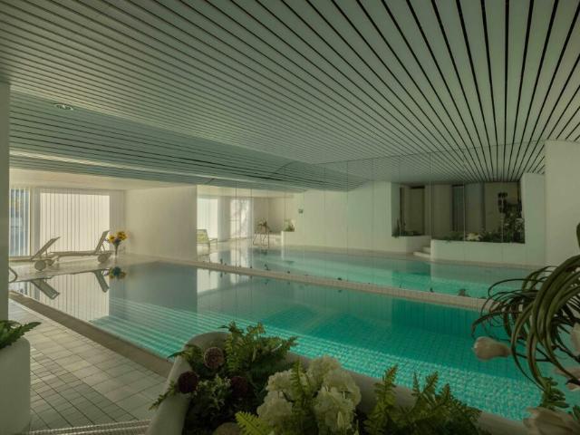 BELLISSIMO 1.5 A REDDITO CON PISCINA E GIARDINO A MORCOTE