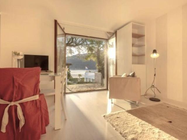 BELLISSIMO 1.5 A REDDITO CON PISCINA E GIARDINO A MORCOTE