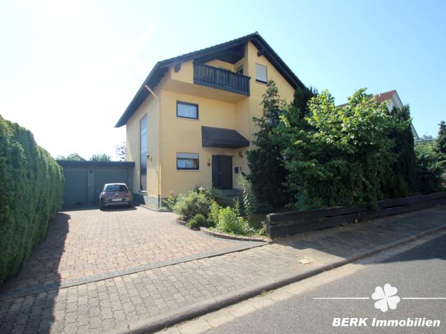 BERK Immobilien Charmantes Einfamilienhaus mit schönem Garten in TOP Wohnlage von Mainaschaff