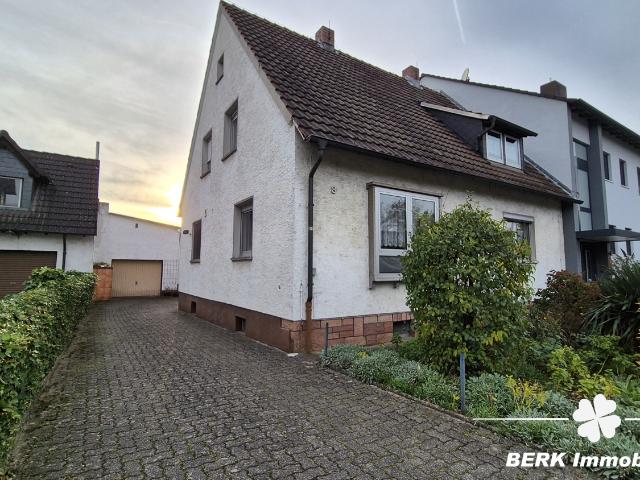 BERK Immobilien – Familienfreundliches Haus mit viel Platz und vielseitigem Nebengebäude