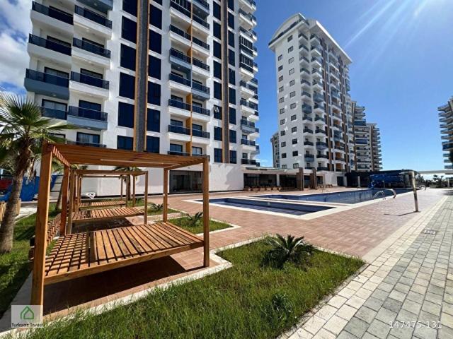 BEST OFFER ! ALANYA MAHMUTLAR'DA 2+1 AKTİVİTELİ SİTEDE ARA KAT SATILIK DAİRE