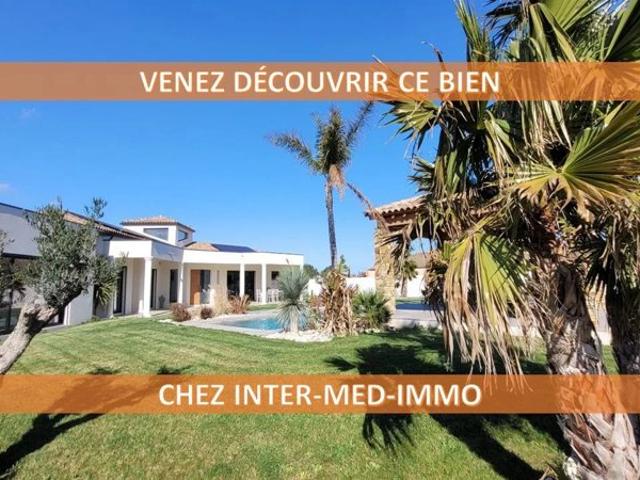 A vendre Bessan 34550 Villa d'Exception offrant Confort et Élégance sur 2552m² de terrain paysager avec piscine et garage